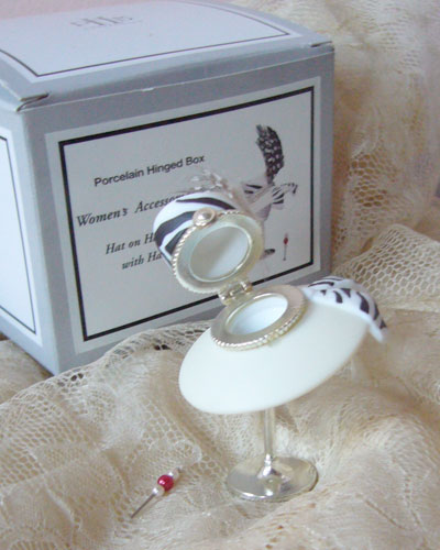 Hat on a stand with hat pin